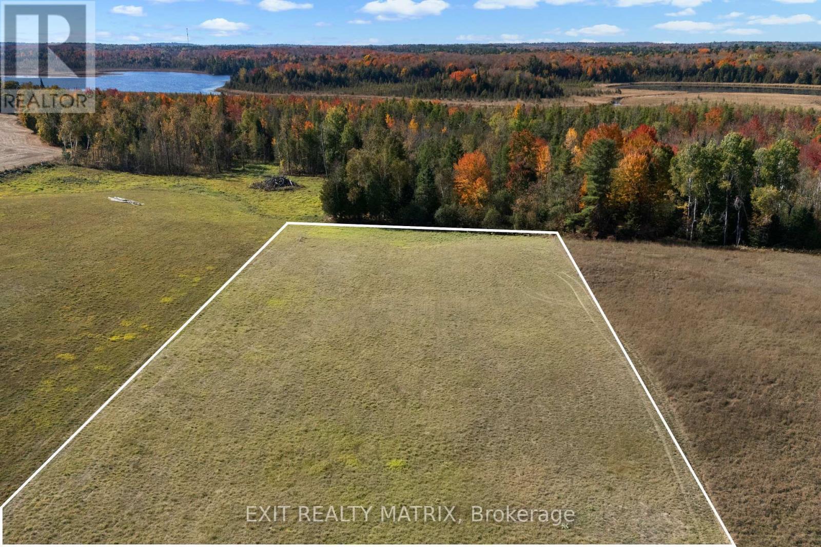 Rear view of lot backing onto woods - 5359 Highway 511 Highway, Lanark Highlands, ON