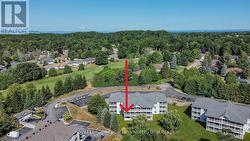 Aerial View of Rear Covered Deck + Golf Course -