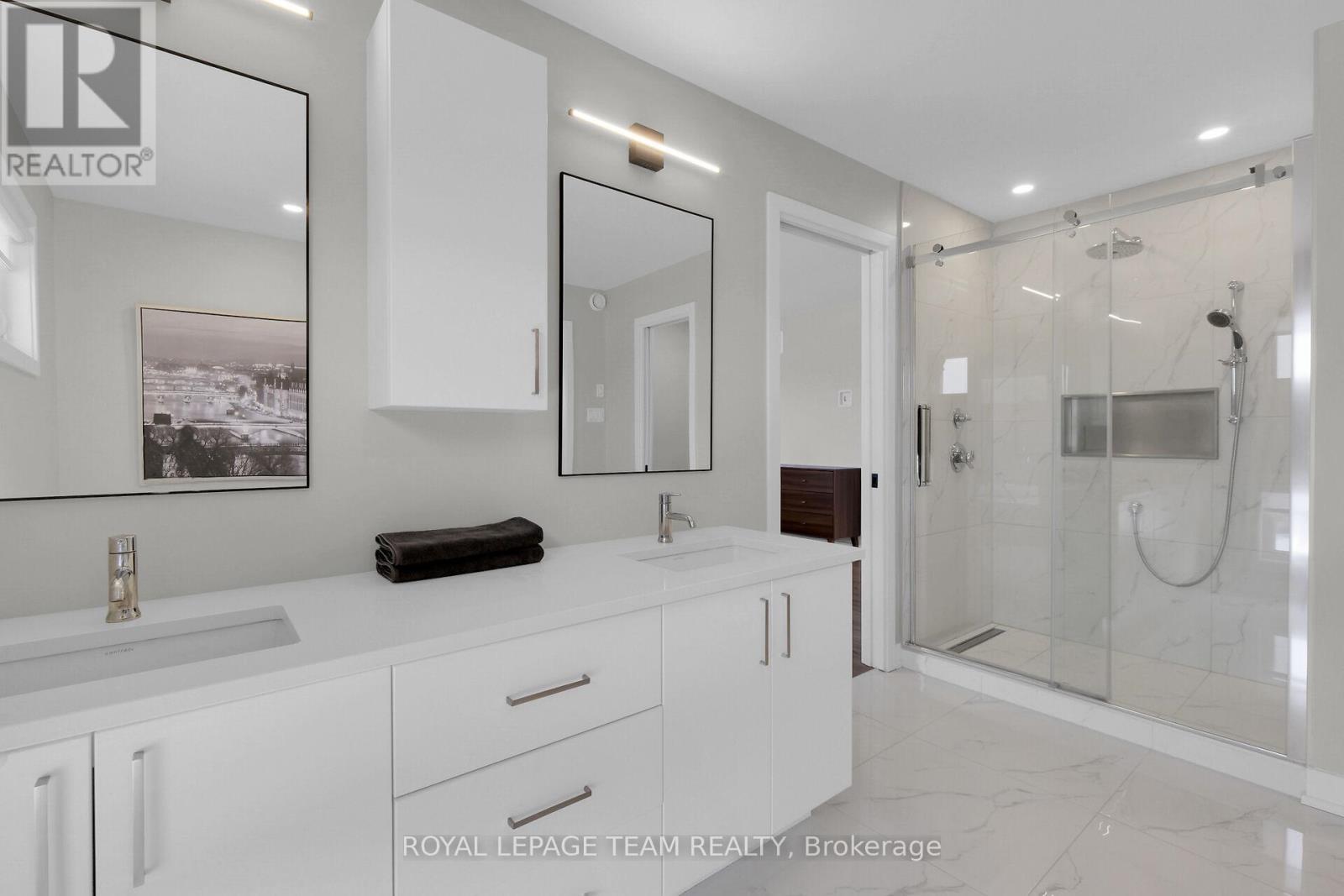 Double sinks & tile shower in Ensuite. - 504 Barrage Street, Casselman, ON - Indoor Photo Showing Bathroom