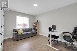 Bedroom w/HDW floors; currently used as an office. -