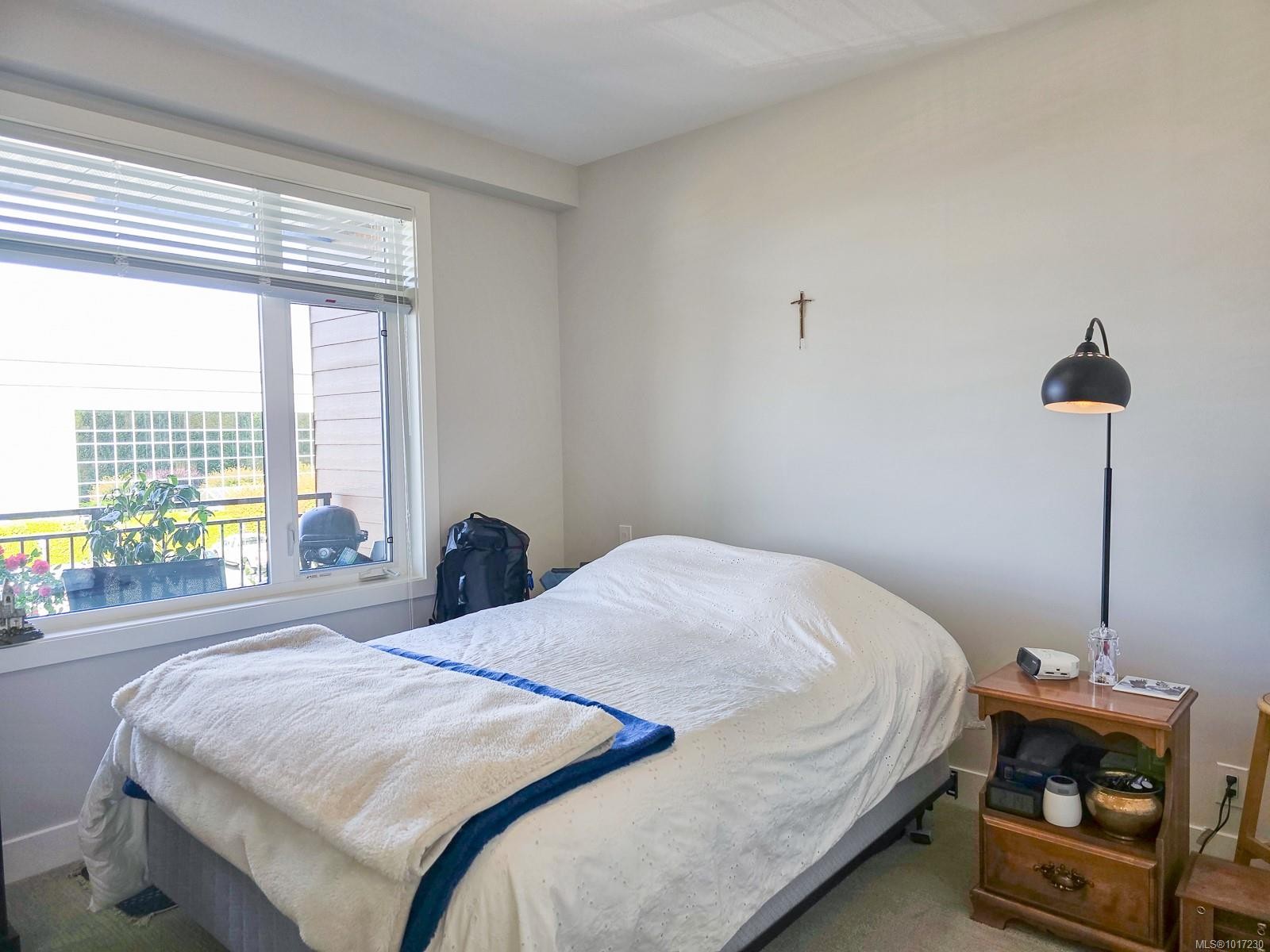 204-6544 Metral Dr, Nanaimo, BC - Indoor Photo Showing Bedroom