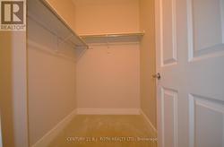 PRIMARY WALK IN CLOSET -