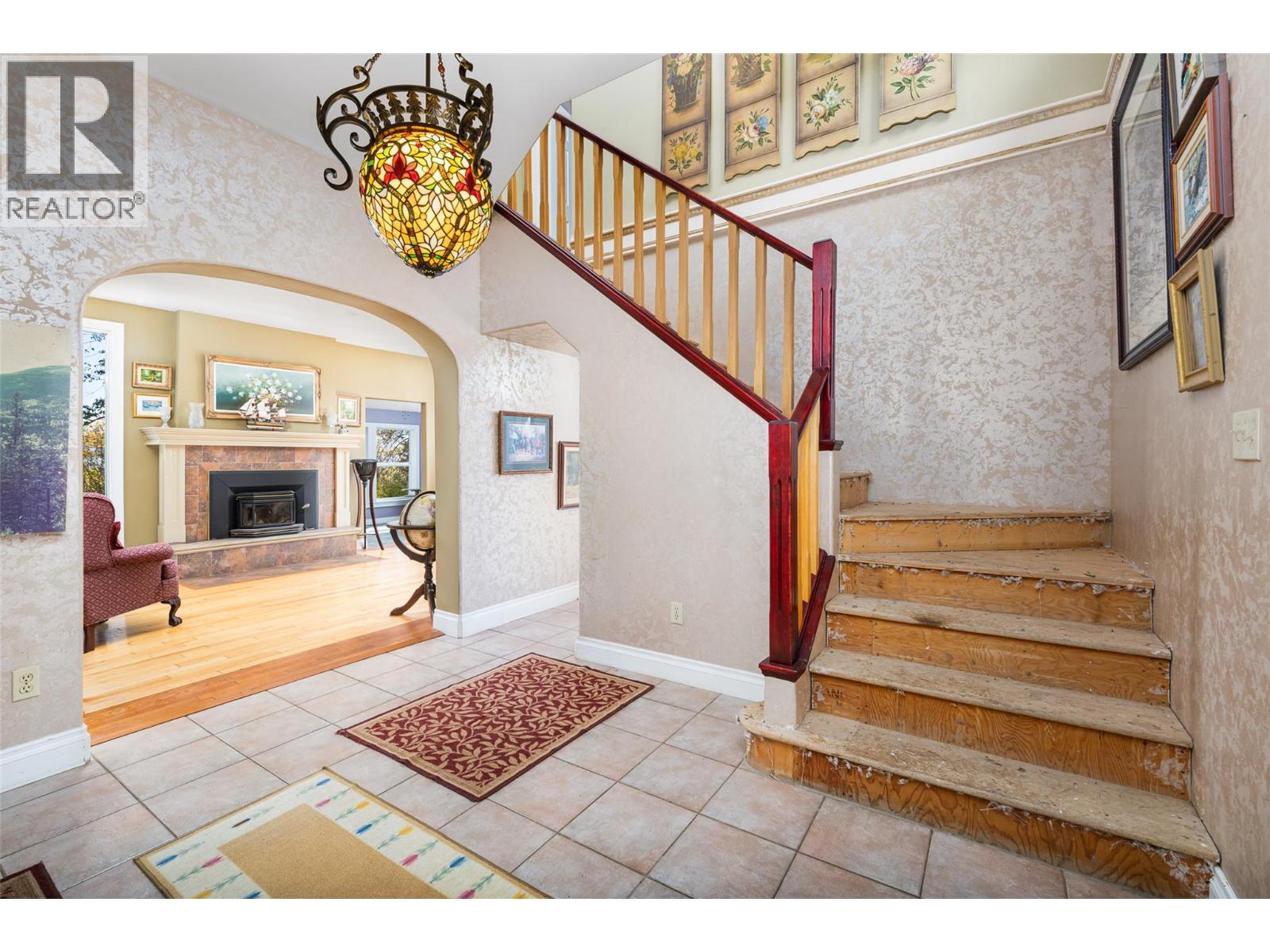 5662 3A Highway, Wynndel, BC - Indoor Photo Showing Other Room With Fireplace