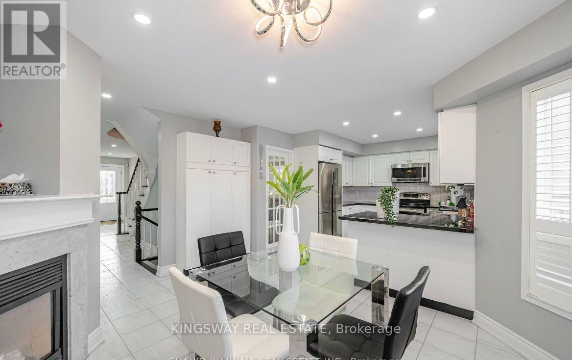 5103 Silverwater Mill Crescent, Mississauga, ON - Indoor Photo Showing Dining Room With Fireplace