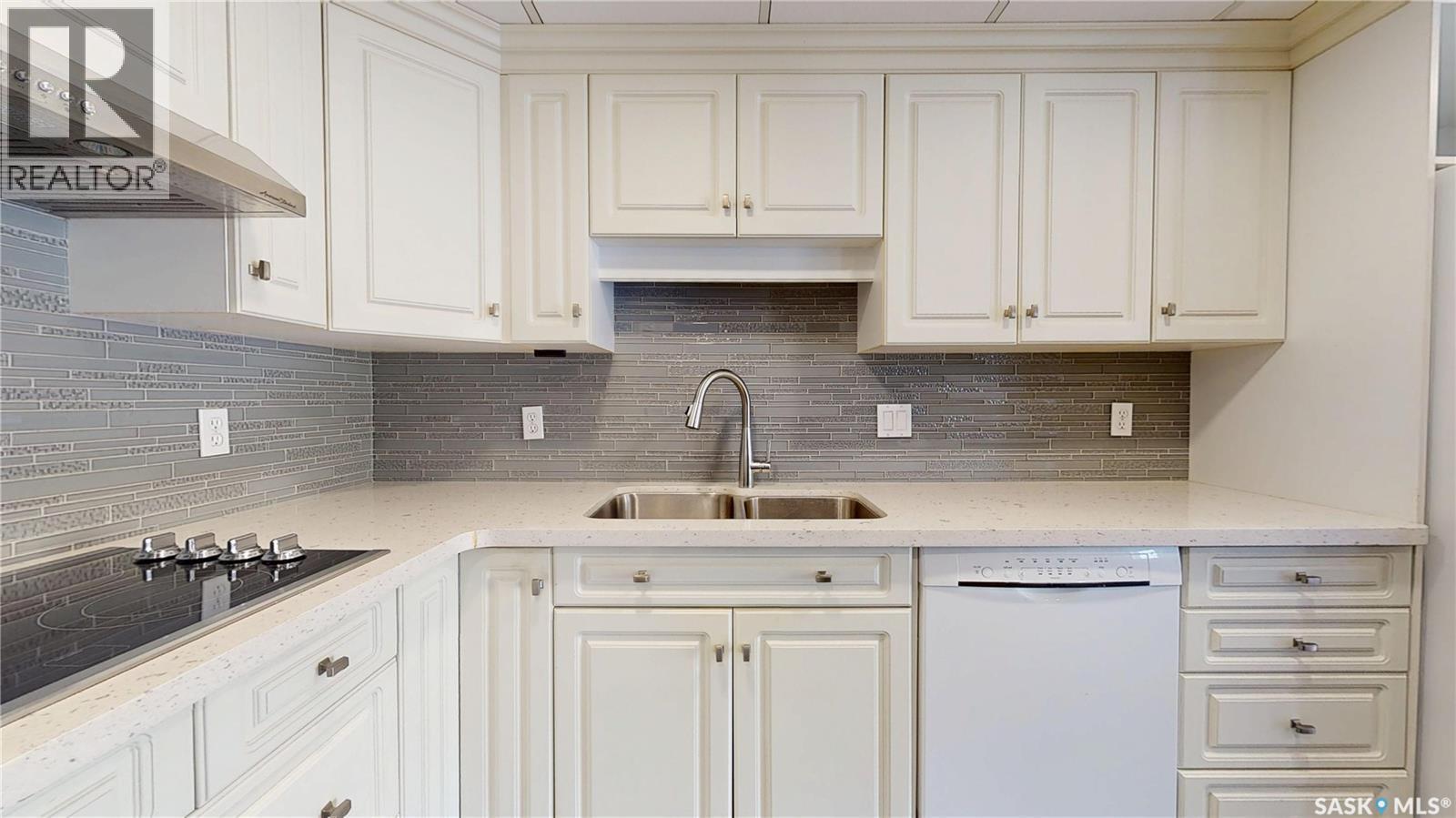 212 2050 College Avenue, Regina, SK - Indoor Photo Showing Kitchen With Upgraded Kitchen