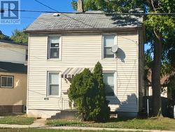 Bus Stop in Front of Building -