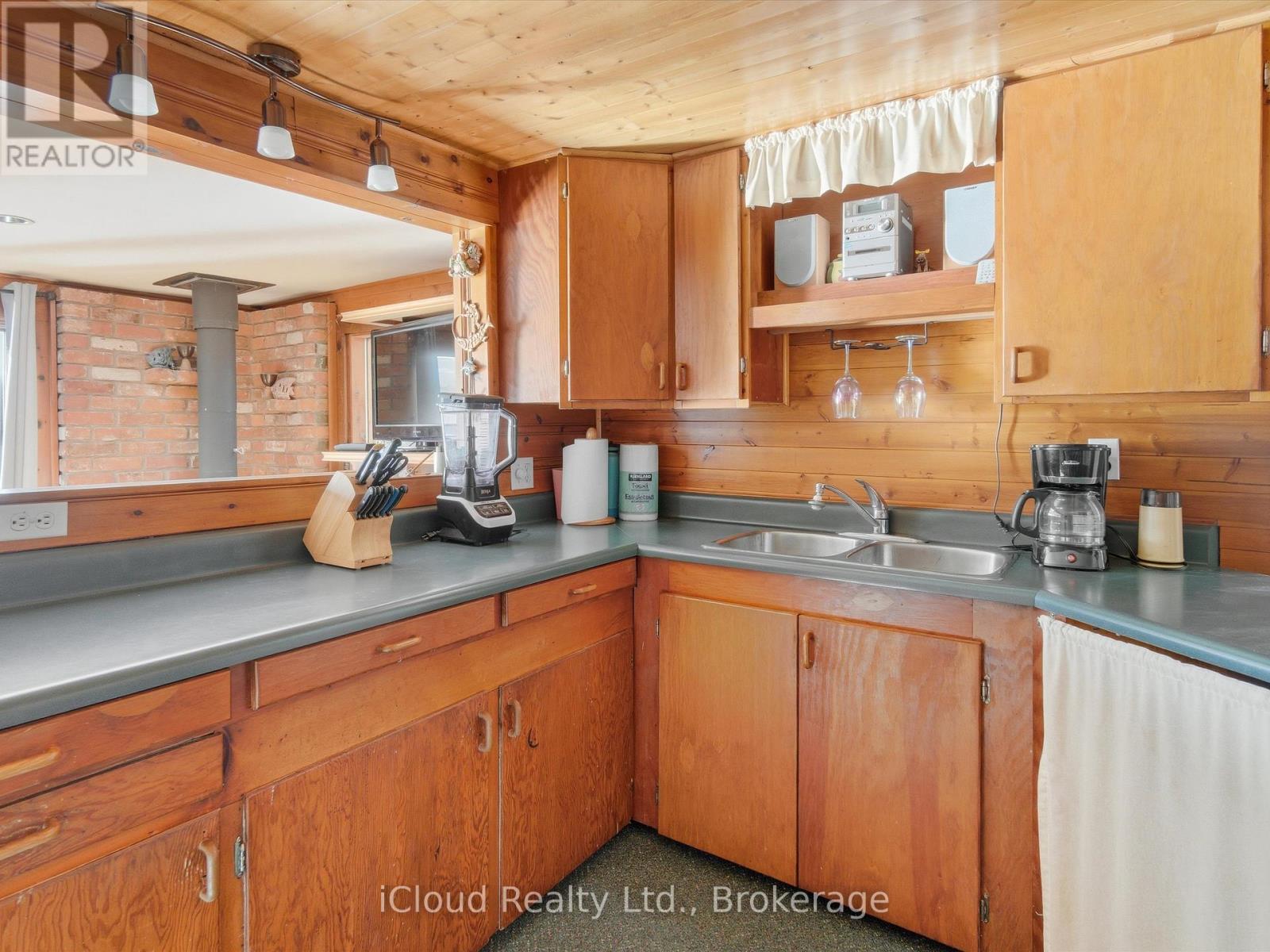 1128 124 Highway, Whitestone, ON - Indoor Photo Showing Kitchen With Double Sink