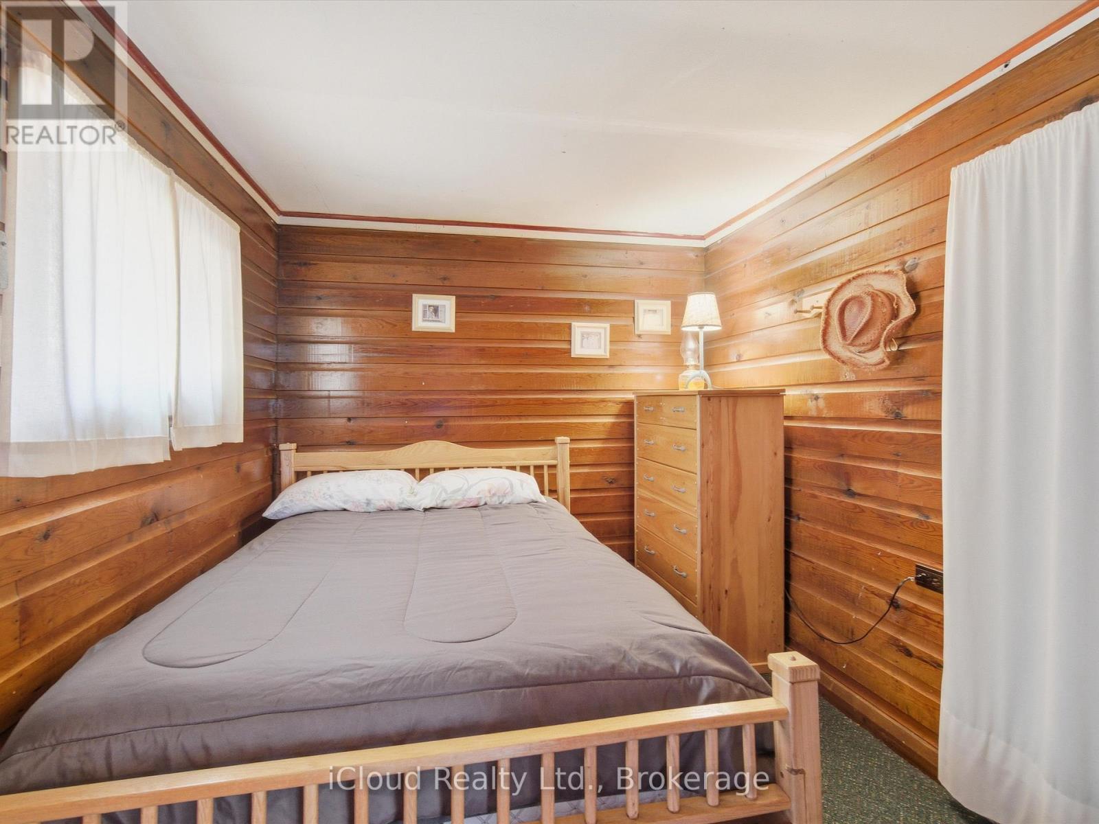 1128 124 Highway, Whitestone, ON - Indoor Photo Showing Bedroom
