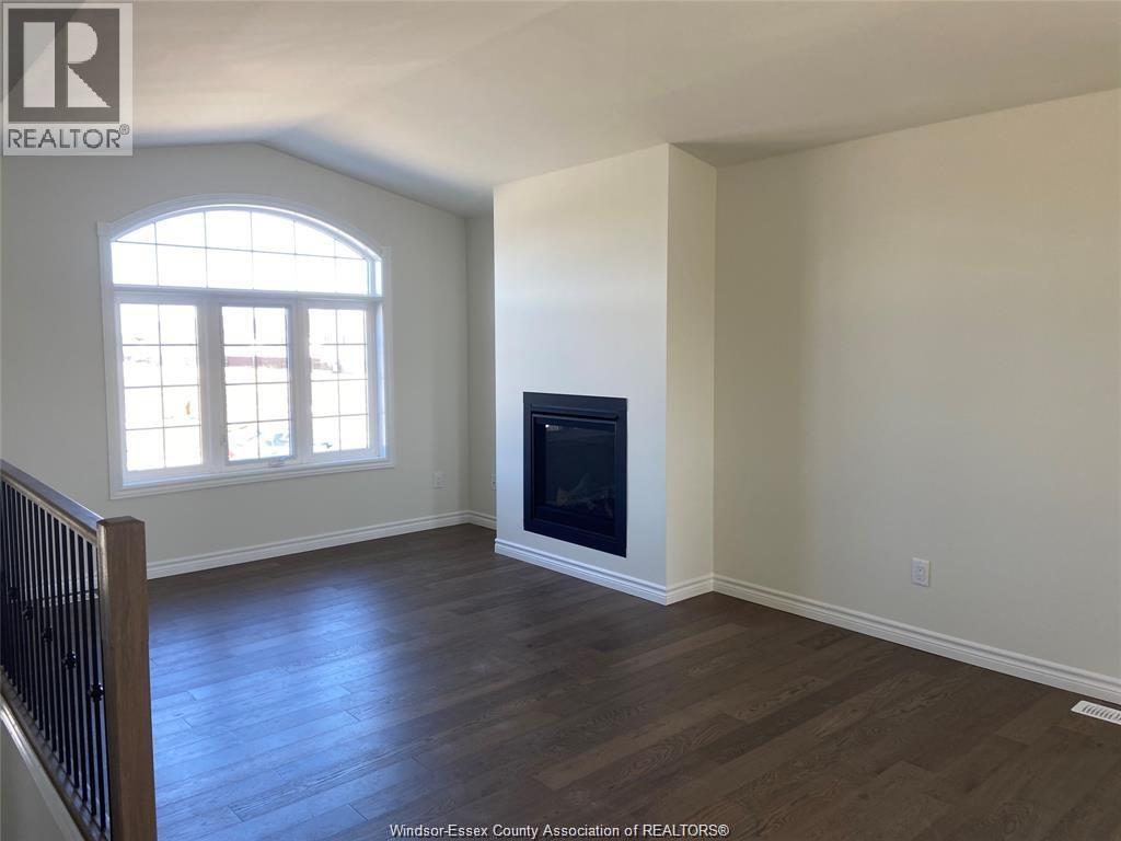 1061 Aspen Ridge Crescent, Lakeshore, ON - Indoor With Fireplace