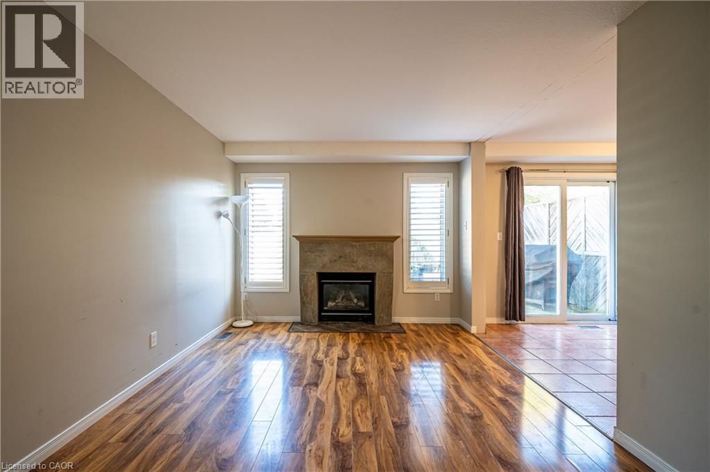 646 Basswood Street Unit# A, Waterloo, ON - Indoor Photo Showing Living Room With Fireplace