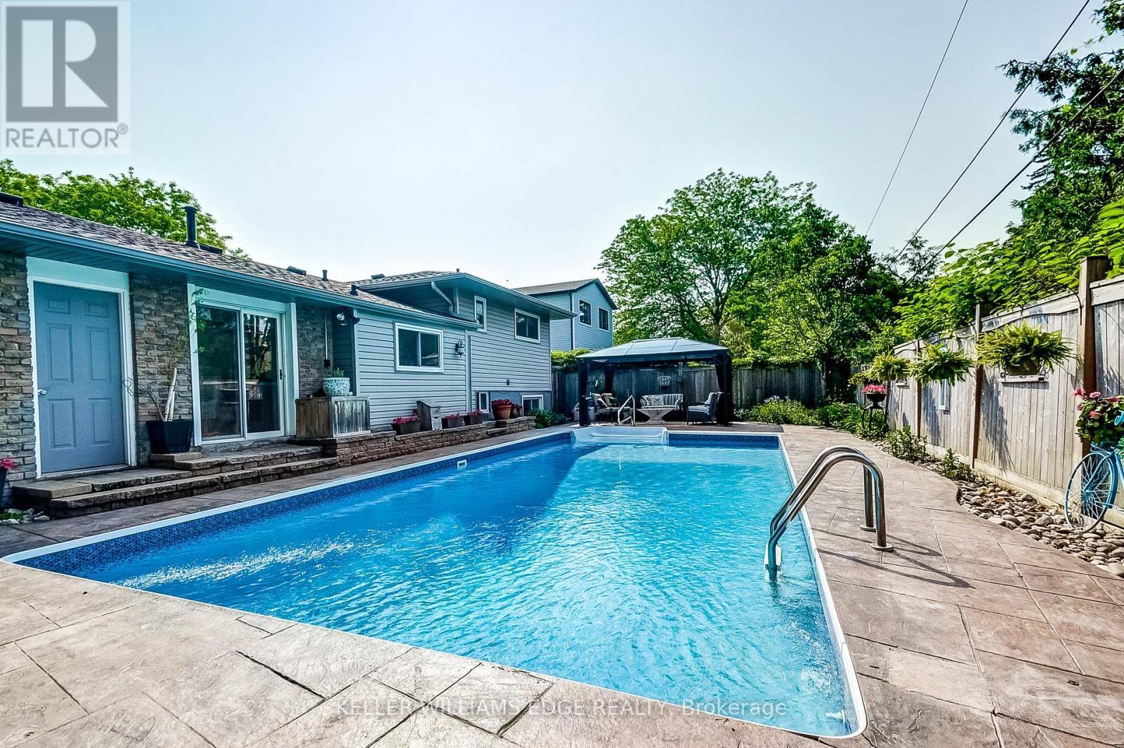 5203 Broughton Crescent, Burlington, ON - Outdoor With In Ground Pool