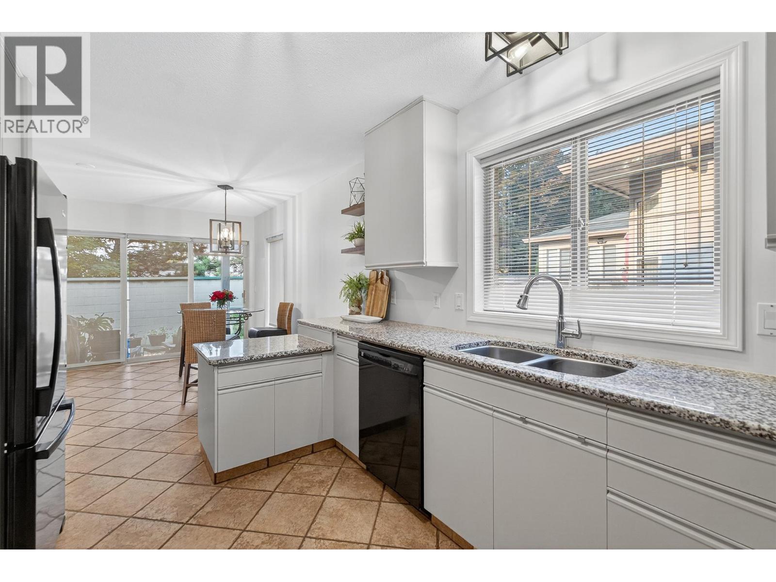 2330 Butt Road Unit# 407, West Kelowna, BC - Indoor Photo Showing Kitchen With Double Sink