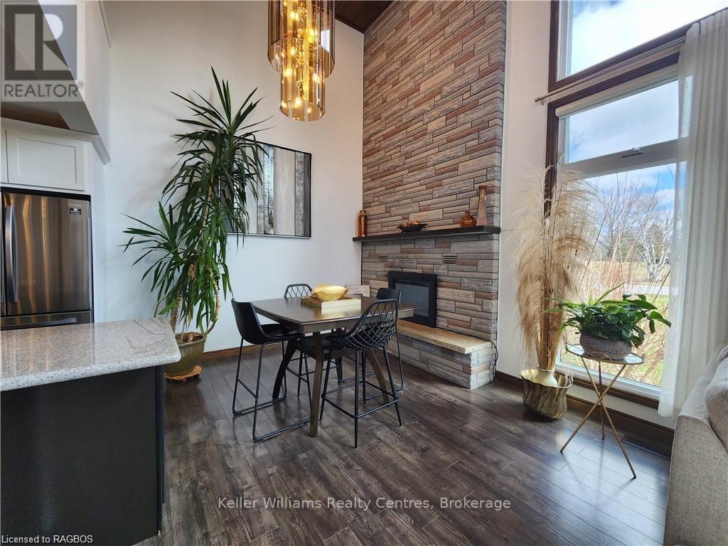 250 Tyendinaga Drive, Saugeen Shores, ON - Indoor Photo Showing Dining Room With Fireplace