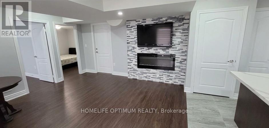 B - 165 Russell Creek Drive, Brampton, ON - Indoor With Fireplace