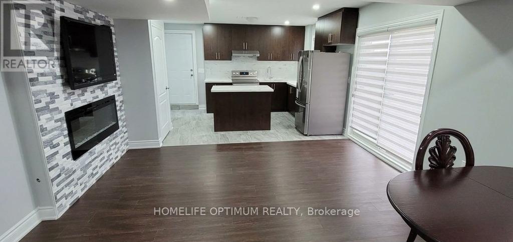 B - 165 Russell Creek Drive, Brampton, ON - Indoor Photo Showing Kitchen With Fireplace