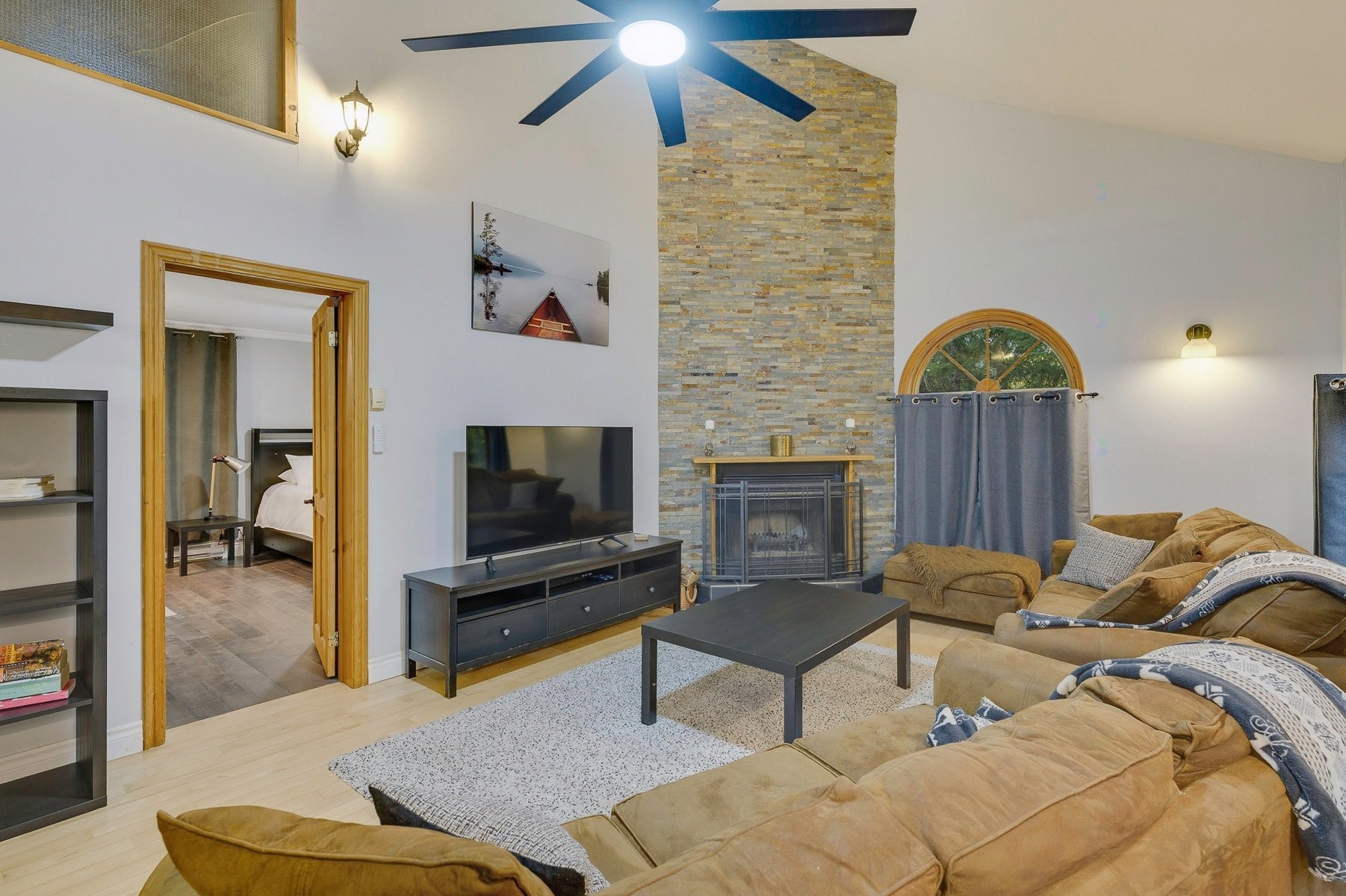 Living Room - 870A Rue De L'Olympiade, Sainte-Adèle, QC - Indoor Photo Showing Living Room With Fireplace