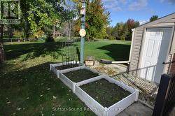 Raised Garden and door from lower walkup -