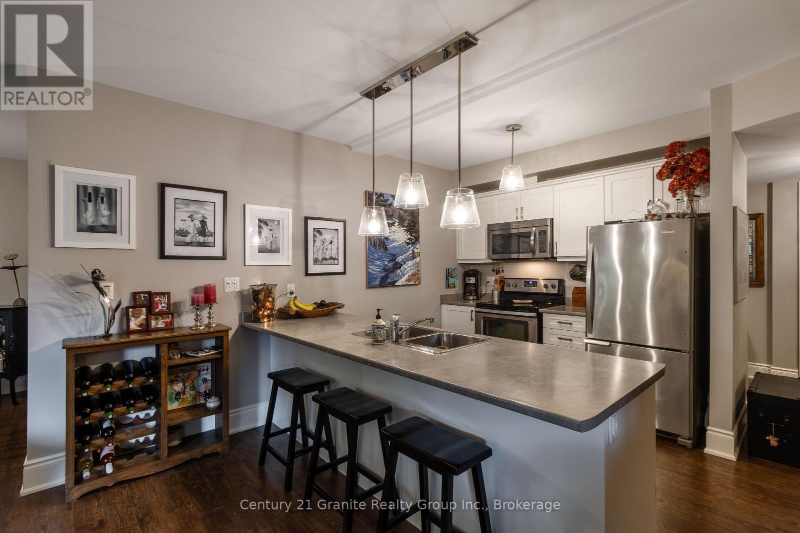 101 - 9 Newcastle Street, Minden Hills (Minden), ON - Indoor Photo Showing Kitchen With Double Sink