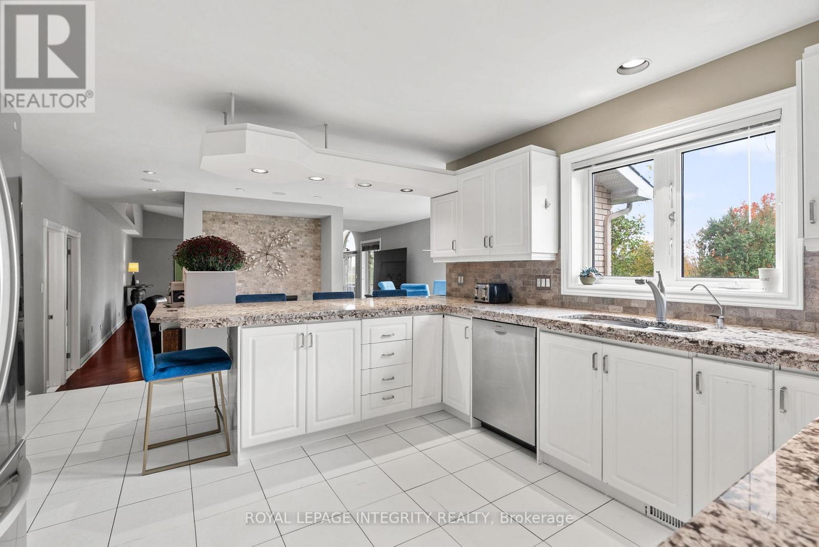 Granite Countertops & Travertine Backsplash 2011 - 6 Marchbrook Circle, Ottawa, ON - Indoor Photo Showing Kitchen