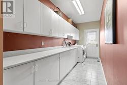 Impressive Laundry Room with exterior access -