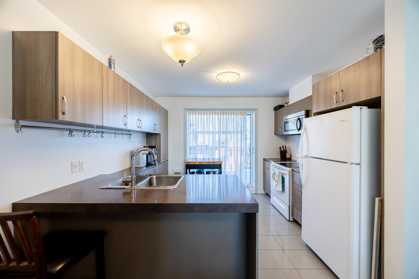 Cuisine - 6-221 Boul. Bouchard, Dorval, QC - Indoor Photo Showing Kitchen With Double Sink