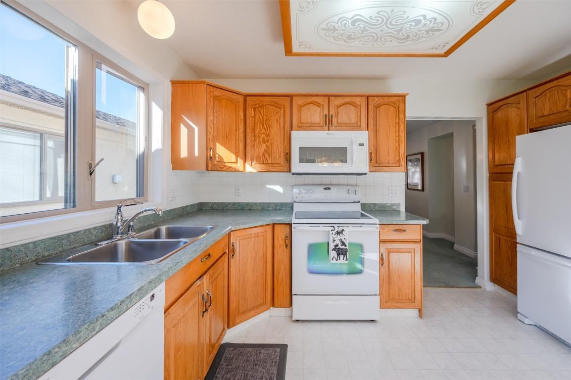 53-3333 South Main Street, Penticton, BC - Indoor Photo Showing Kitchen With Double Sink