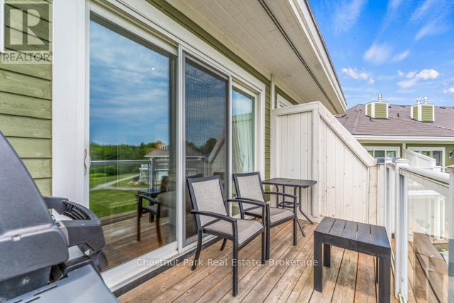 B#206 - 1869 Muskoka Road 118 Highway W, Muskoka Lakes (Monck (Muskoka Lakes)), ON - Outdoor With Deck Patio Veranda With Exterior