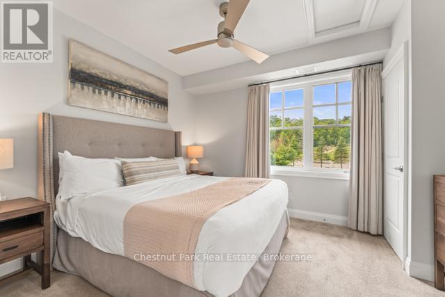 B#206 - 1869 Muskoka Road 118 Highway W, Muskoka Lakes (Monck (Muskoka Lakes)), ON - Indoor Photo Showing Bedroom