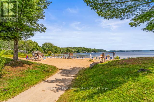 B#206 - 1869 Muskoka Road 118 Highway W, Muskoka Lakes (Monck (Muskoka Lakes)), ON - Outdoor With Body Of Water With View