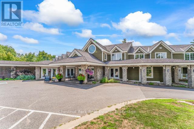 B#206 - 1869 Muskoka Road 118 Highway W, Muskoka Lakes (Monck (Muskoka Lakes)), ON - Outdoor With Facade