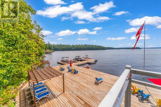 B#206 - 1869 Muskoka Road 118 Highway W, Muskoka Lakes (Monck (Muskoka Lakes)), ON - Outdoor With Body Of Water With View