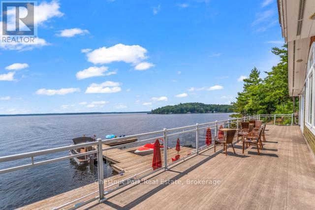 B#206 - 1869 Muskoka Road 118 Highway W, Muskoka Lakes (Monck (Muskoka Lakes)), ON - Outdoor With Body Of Water With View