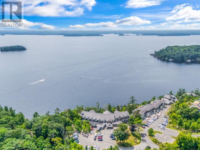 B#206 - 1869 Muskoka Road 118 Highway W, Muskoka Lakes (Monck (Muskoka Lakes)), ON - Outdoor With Body Of Water With View