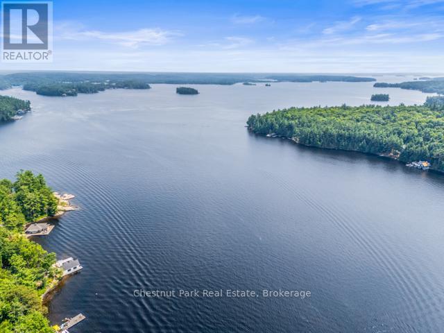 B#206 - 1869 Muskoka Road 118 Highway W, Muskoka Lakes (Monck (Muskoka Lakes)), ON - Outdoor With Body Of Water With View