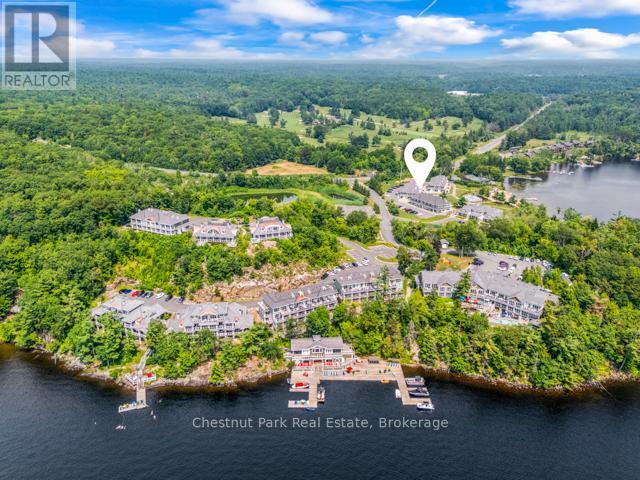 B#206 - 1869 Muskoka Road 118 Highway W, Muskoka Lakes (Monck (Muskoka Lakes)), ON - Outdoor With Body Of Water With View
