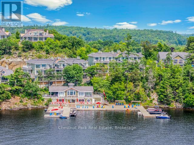 B#206 - 1869 Muskoka Road 118 Highway W, Muskoka Lakes (Monck (Muskoka Lakes)), ON - Outdoor With Body Of Water With View
