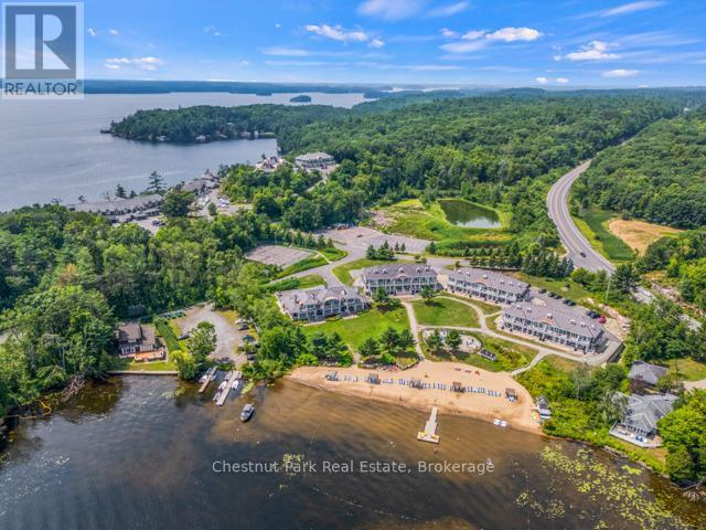 B#206 - 1869 Muskoka Road 118 Highway W, Muskoka Lakes (Monck (Muskoka Lakes)), ON - Outdoor With Body Of Water With View