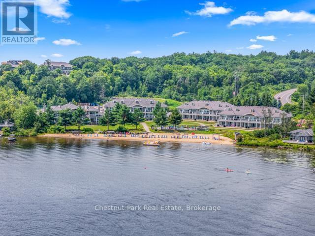B#206 - 1869 Muskoka Road 118 Highway W, Muskoka Lakes (Monck (Muskoka Lakes)), ON - Outdoor With Body Of Water With View