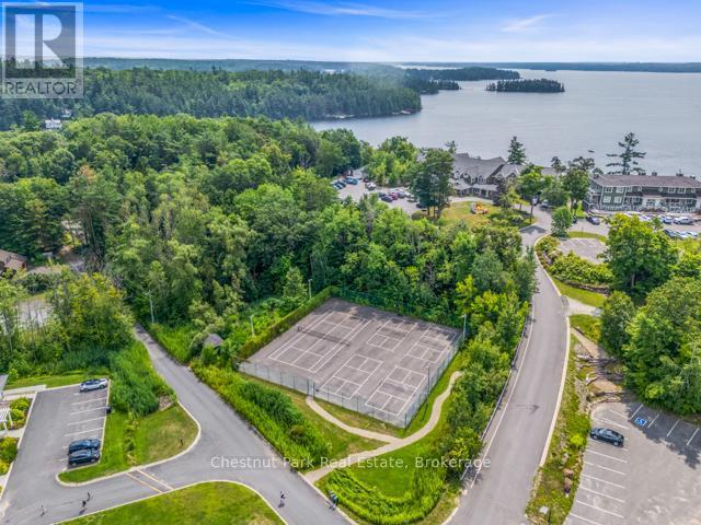 B#206 - 1869 Muskoka Road 118 Highway W, Muskoka Lakes (Monck (Muskoka Lakes)), ON - Outdoor With Body Of Water With View