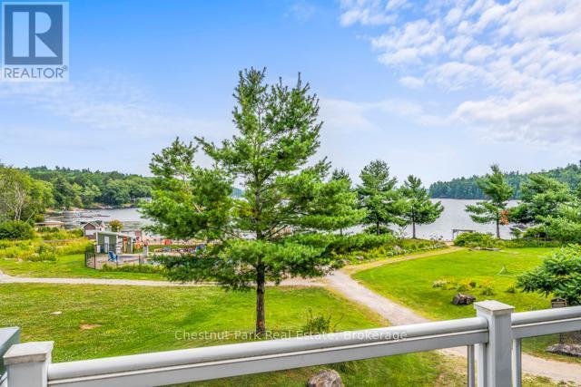 B#206 - 1869 Muskoka Road 118 Highway W, Muskoka Lakes (Monck (Muskoka Lakes)), ON - Outdoor With Body Of Water With View