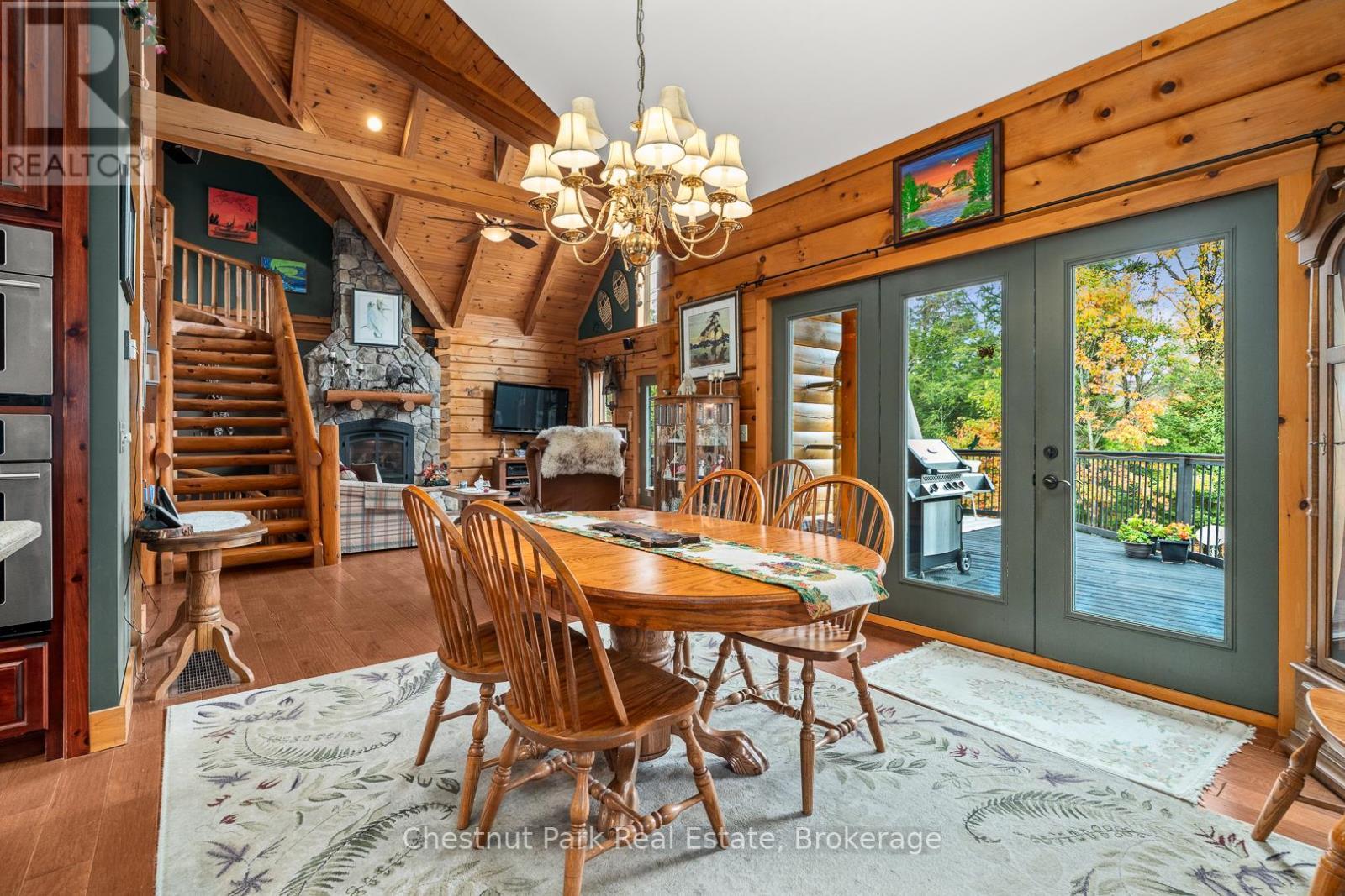 121 Poor Mans Road, Parry Sound Remote Area (Lount), ON - Indoor Photo Showing Dining Room With Fireplace