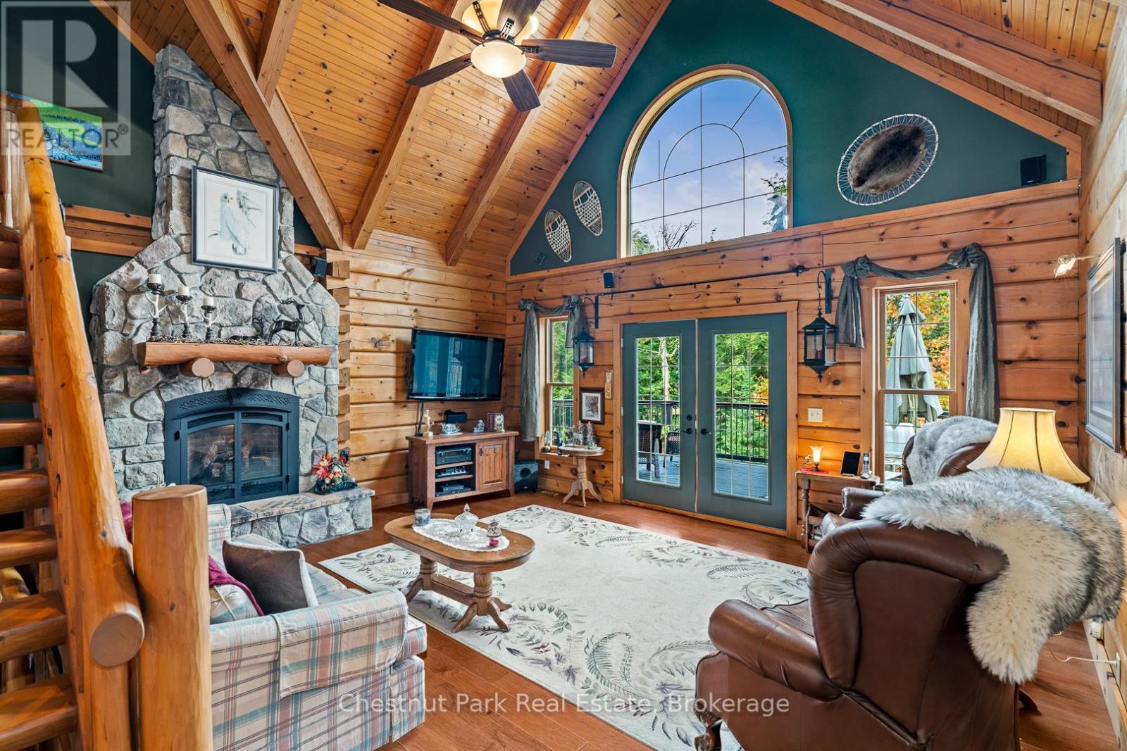 121 Poor Mans Road, Parry Sound Remote Area (Lount), ON - Indoor Photo Showing Living Room With Fireplace