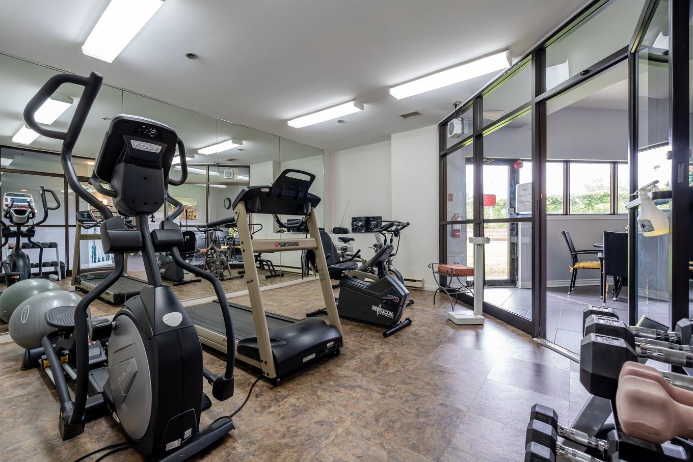 Exercise room - 102-500 Rue St-Francois, Brossard, QC - Indoor Photo Showing Gym Room