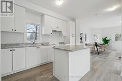 Modern kitchen w/ breakfast area(Virtually Staged) -