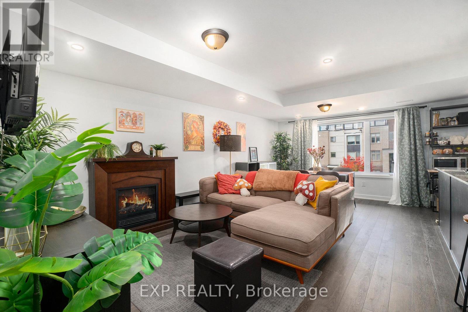 770 Mikinak Road, Ottawa, ON - Indoor Photo Showing Living Room With Fireplace
