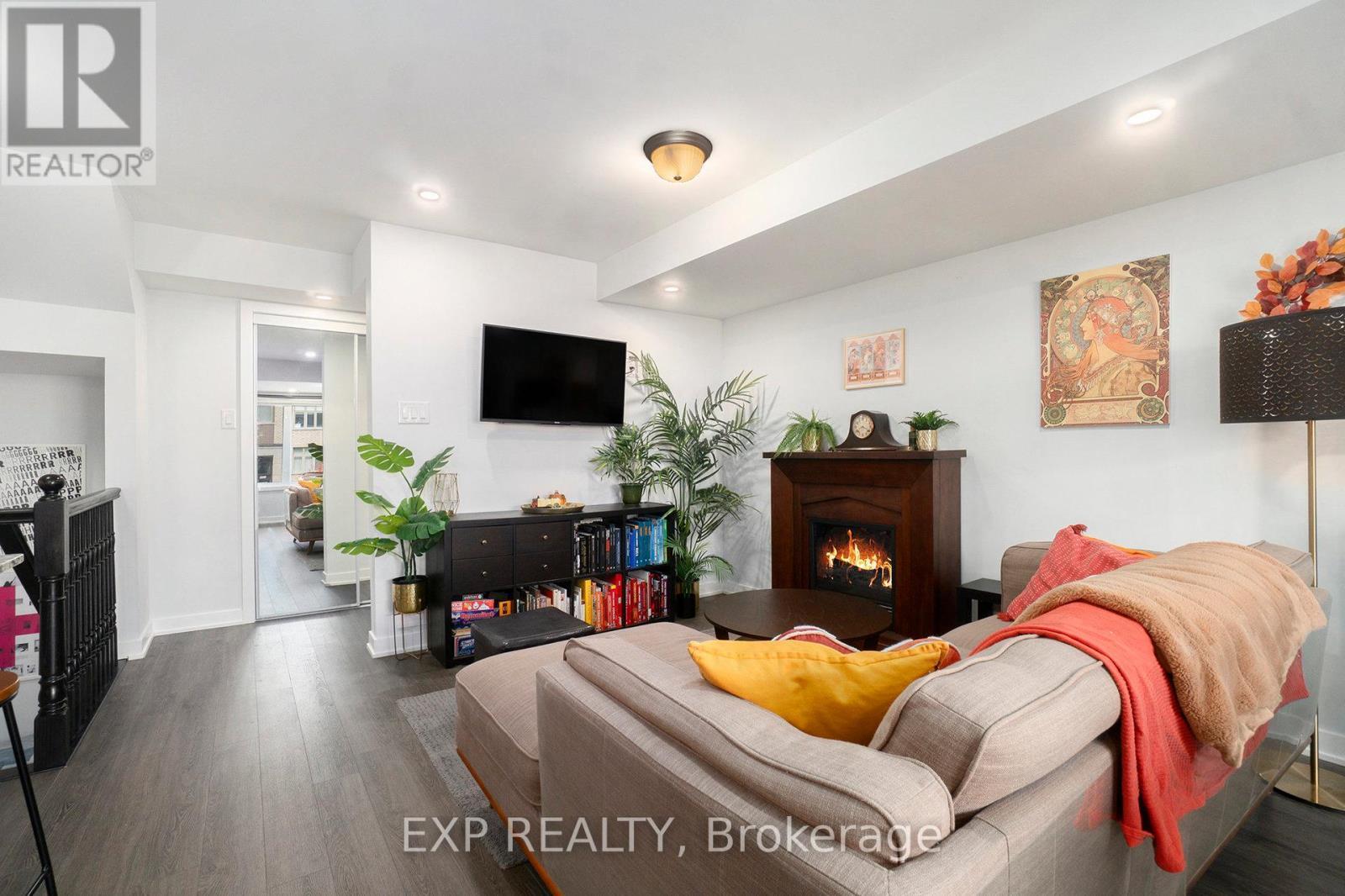 770 Mikinak Road, Ottawa, ON - Indoor Photo Showing Living Room With Fireplace