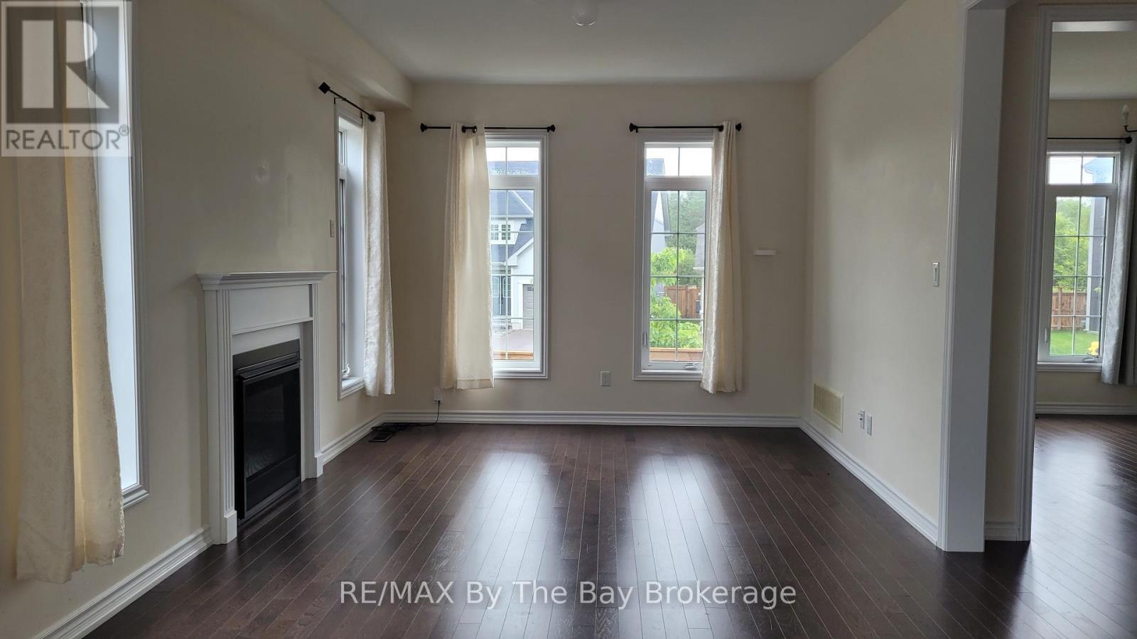 Living Room - 218 Roy Drive, Clearview (Stayner), ON - Indoor With Fireplace