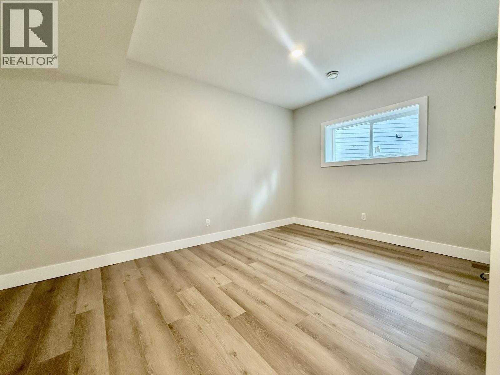 1938 Foxwood Trail Unit# 7, Windermere, BC - Indoor Photo Showing Other Room