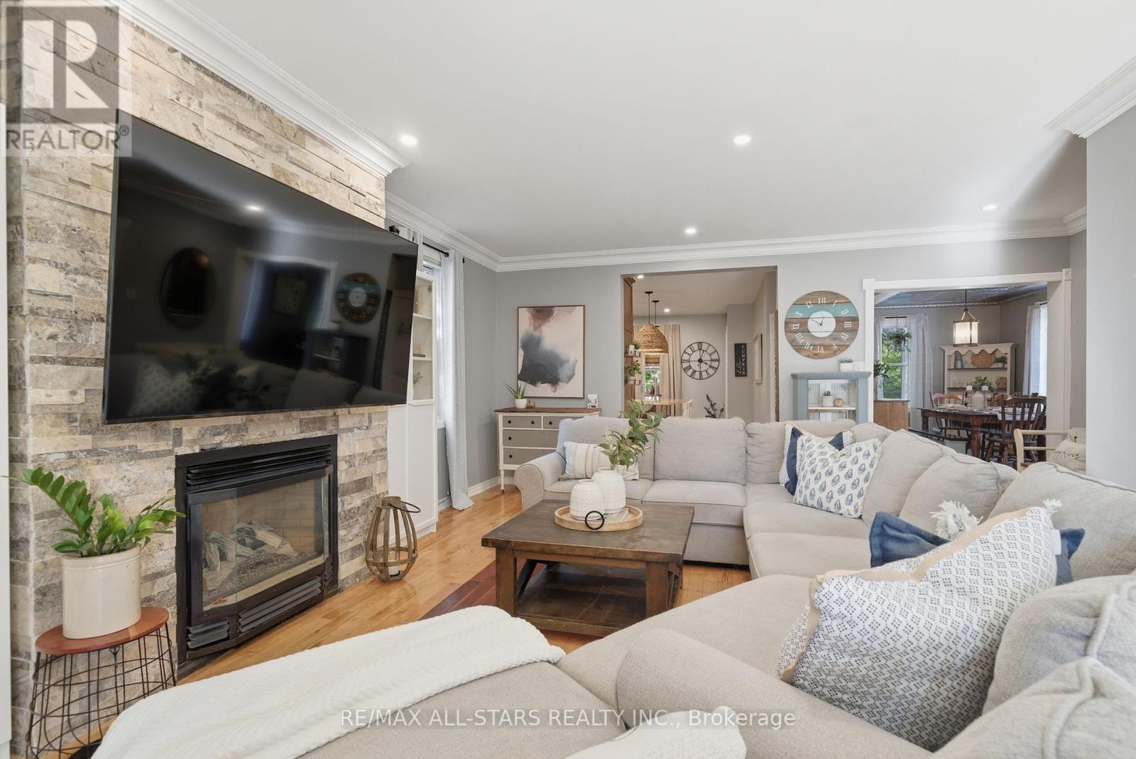 20 Keene Street, Scugog, ON - Indoor Photo Showing Living Room With Fireplace