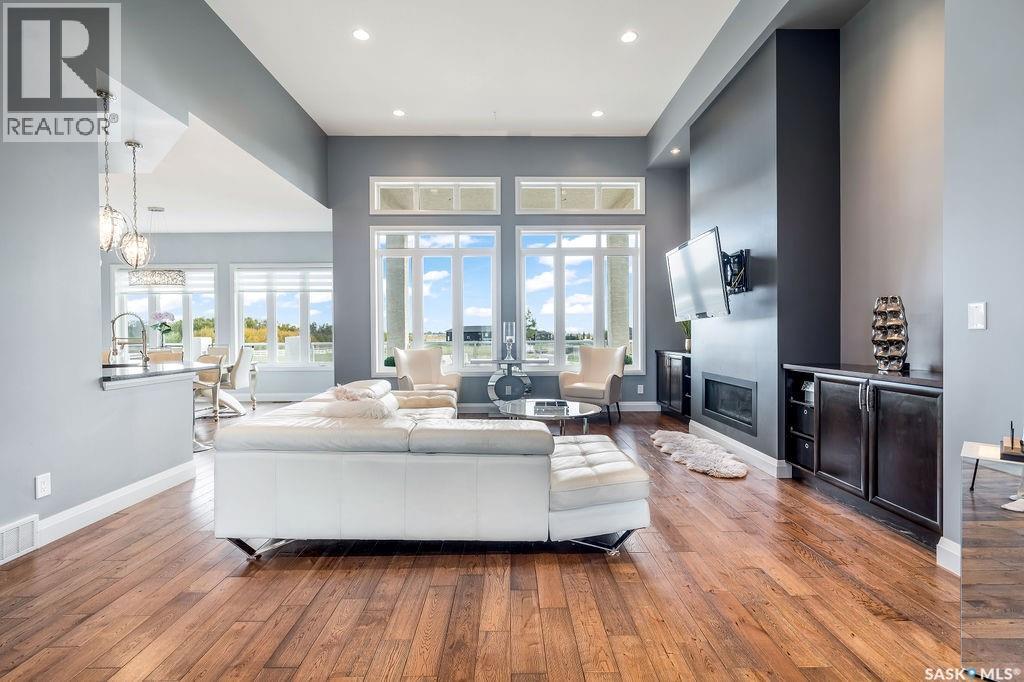 85 Hanley Way, Edenwold Rm No.158, SK - Indoor Photo Showing Living Room With Fireplace